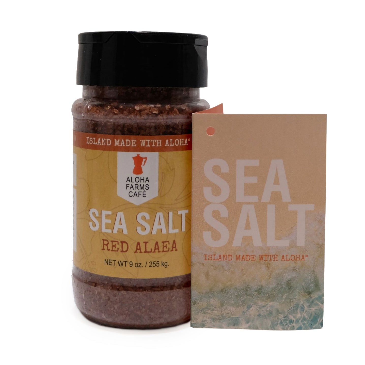 A 9 oz. container of Aloha Farms Hawaii Sea Salt Red Alaea, next to its packaging card with product information.